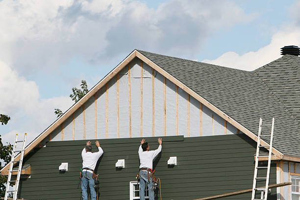 Professional Siding Repair technician working in Bethpage, NY